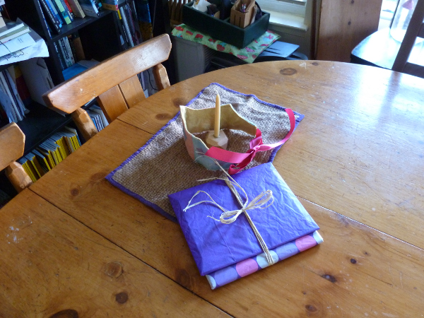 Crown and presents, with beeswax candle